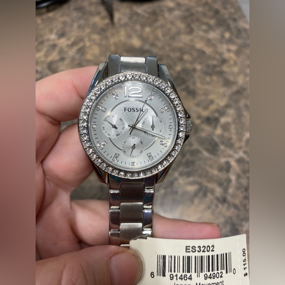 Fossil watch brand new with tags. Super cute silver with rhinestones